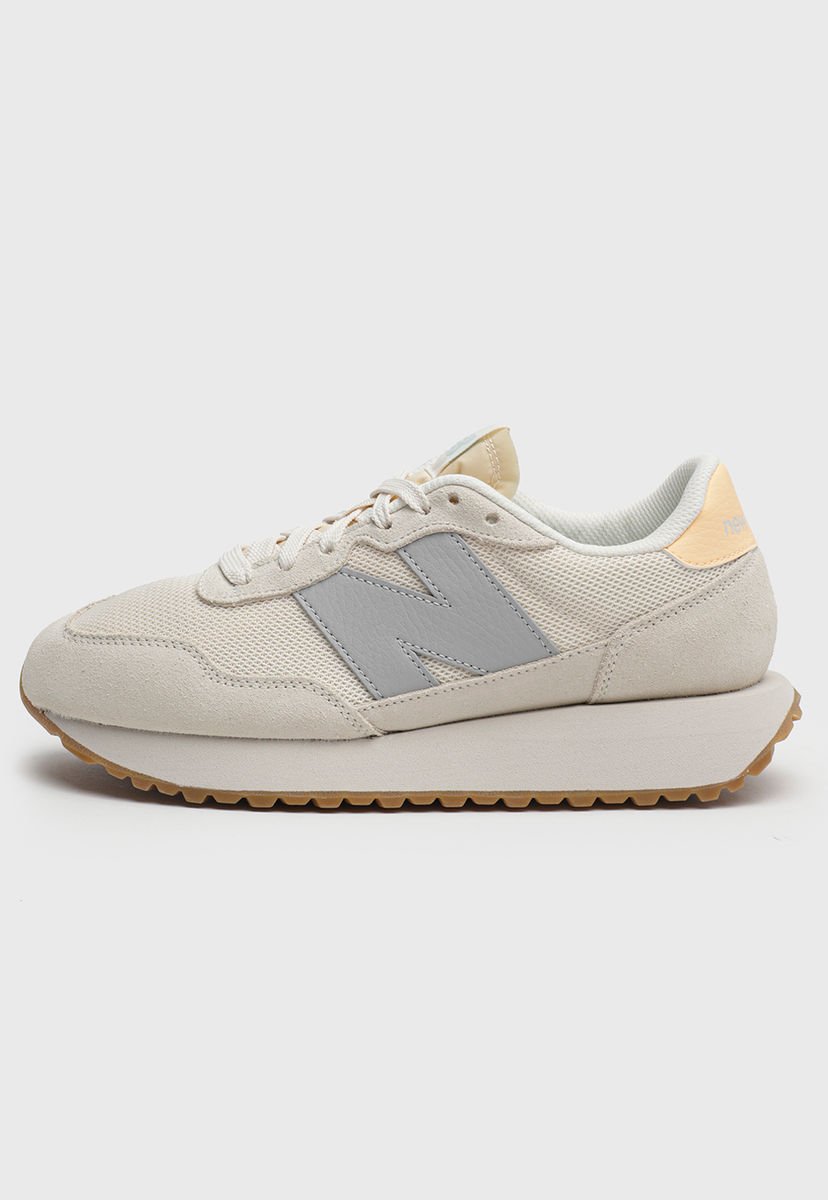 new balance 620 Oro hombre