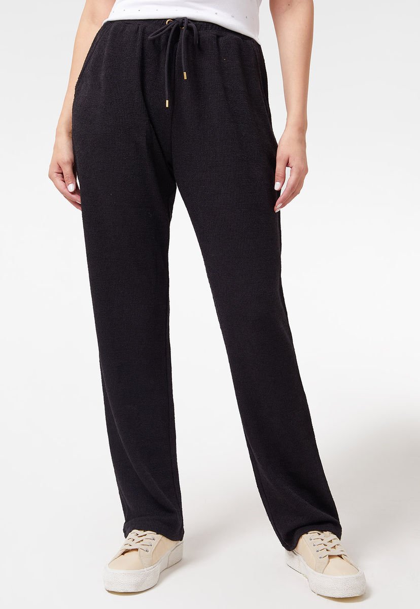 Shops pantalon buzo negro mujer